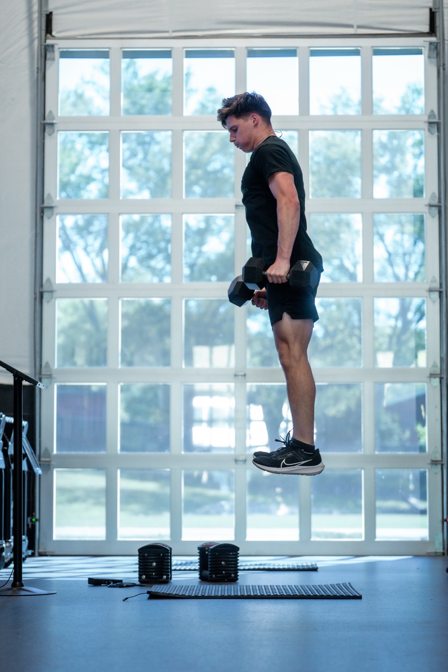 Loaded jump over a Plyomat mat, controllers reading the contact